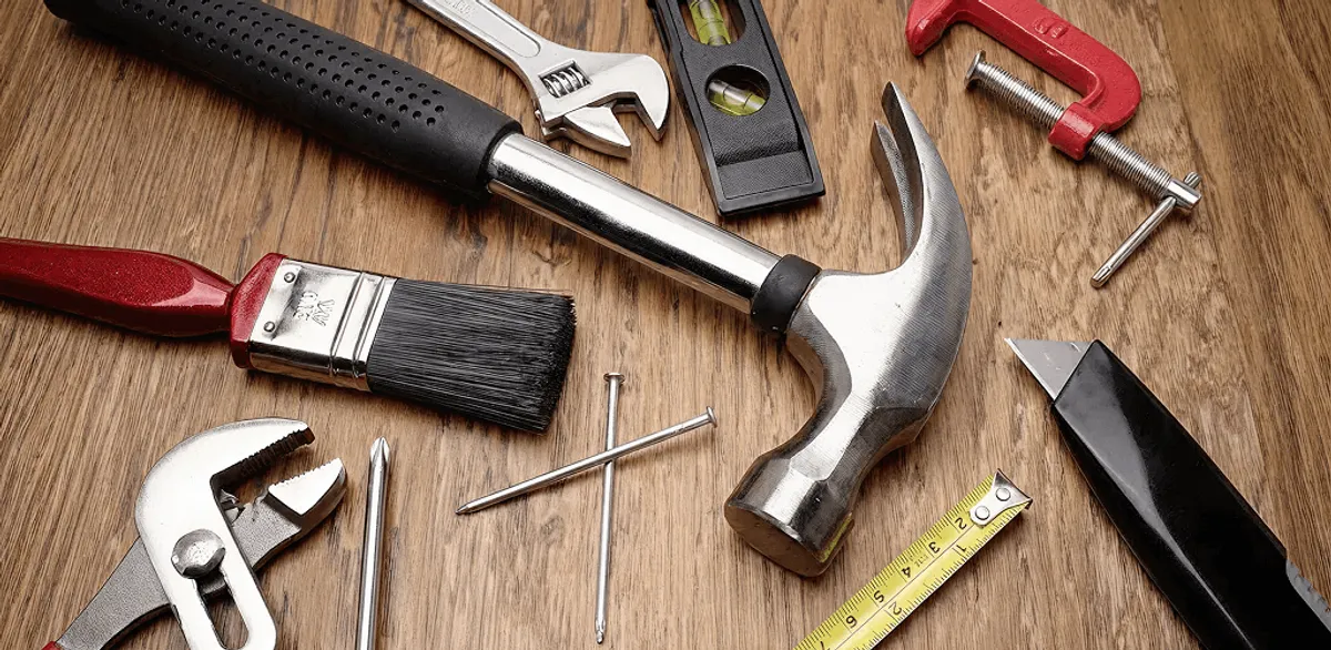 Handyman tools laid out for home repair and maintenance work in Dallas, TX